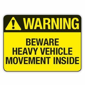 Beware: Heavy Vehicle Movement Inside Signs
